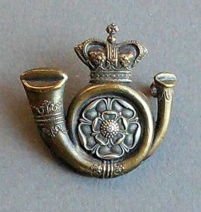 hall-g_Kings-Own-Yorkshire-Light-Infantry-cap-badge-768x809